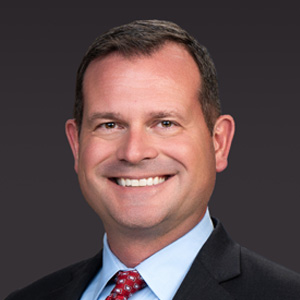 Author headshot photo of Greg Murphy