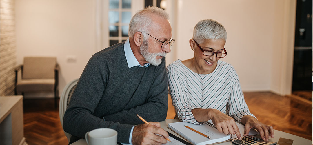 blog-featured-2020_pension_limits-1080x500 Man and woman calculating finances