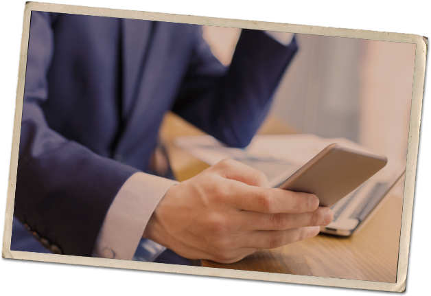 photo-business_mobile-628x431 A business man holding a mobile phone